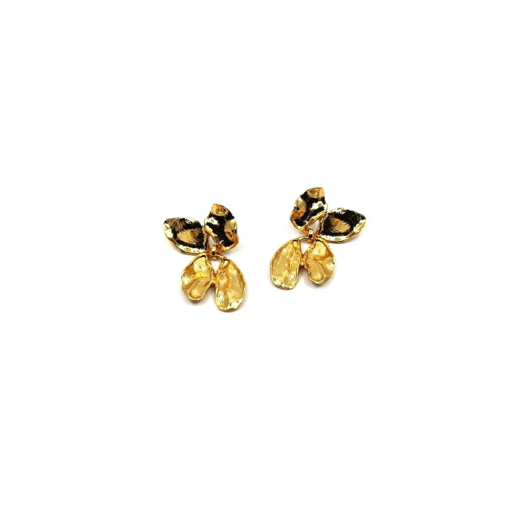 Pair of gold butterfly-shaped earrings on a white background